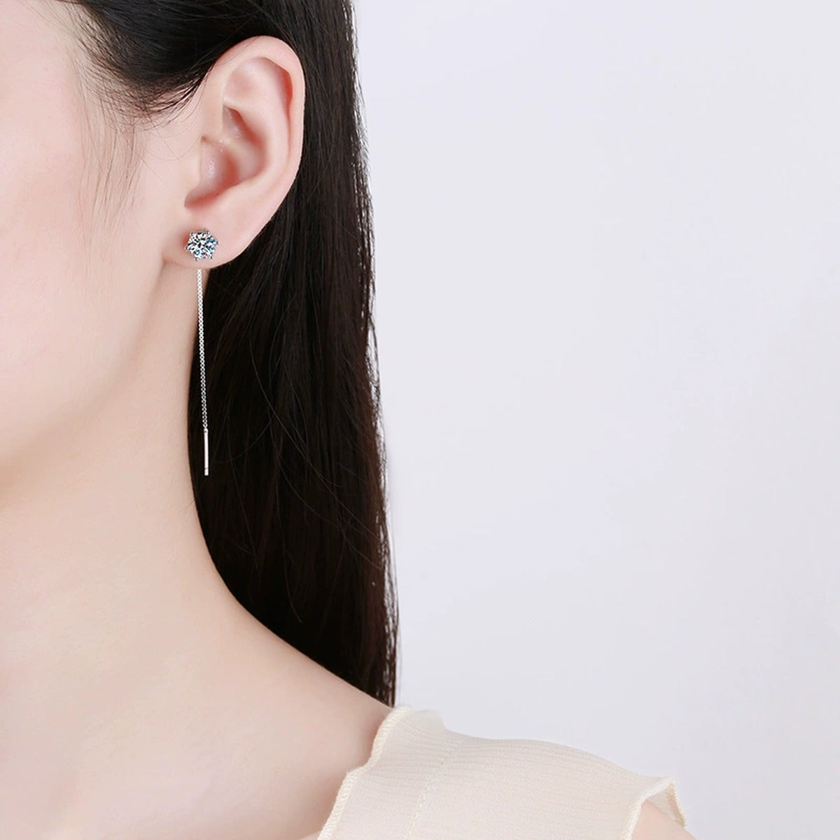 Long Chain Moissanite Threader Earrings in White Gold-Plated S925 Silver worn on ear by model