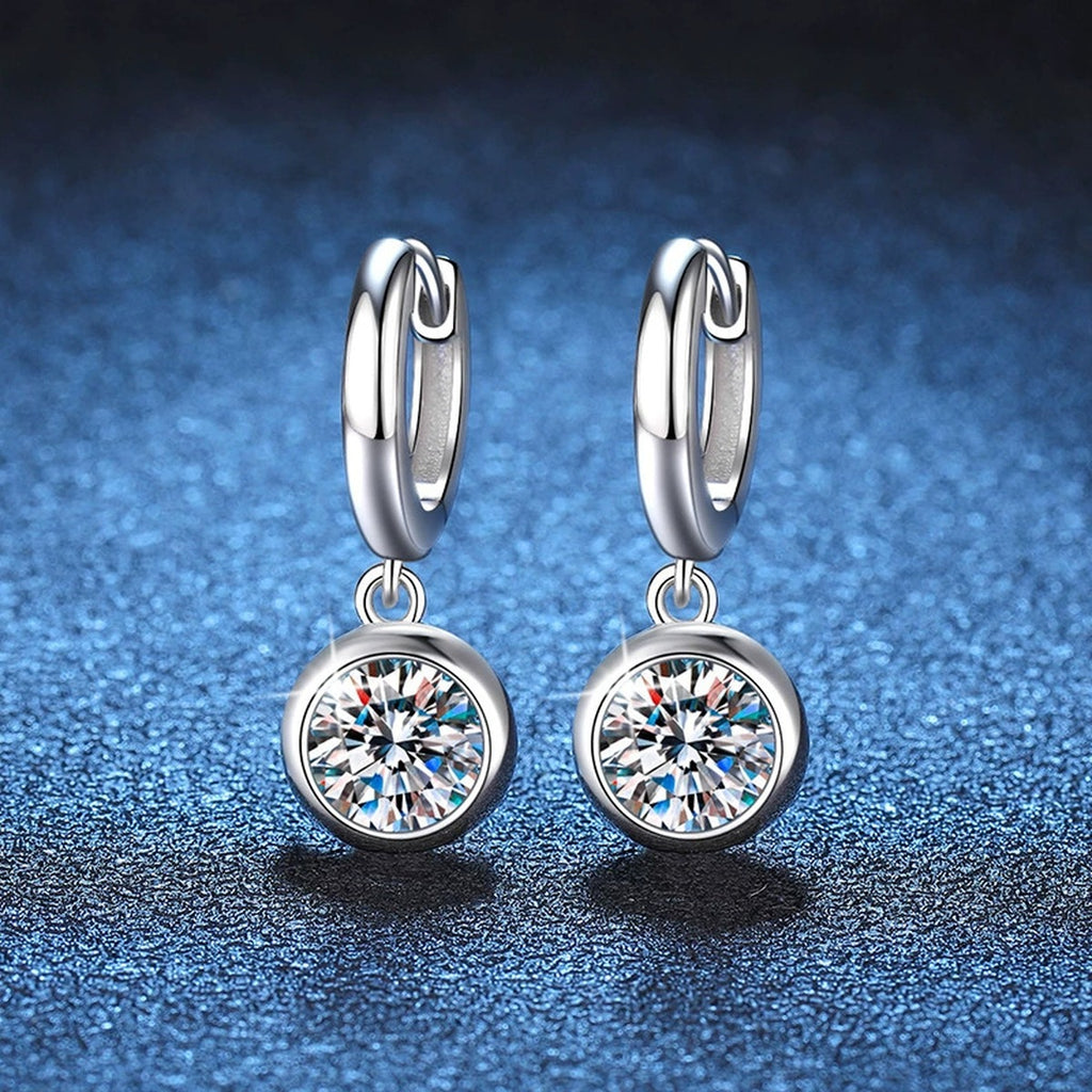 Round Moissanite Hoop Earrings in White Gold-Plated S925 Sterling Silver blue scene angled view