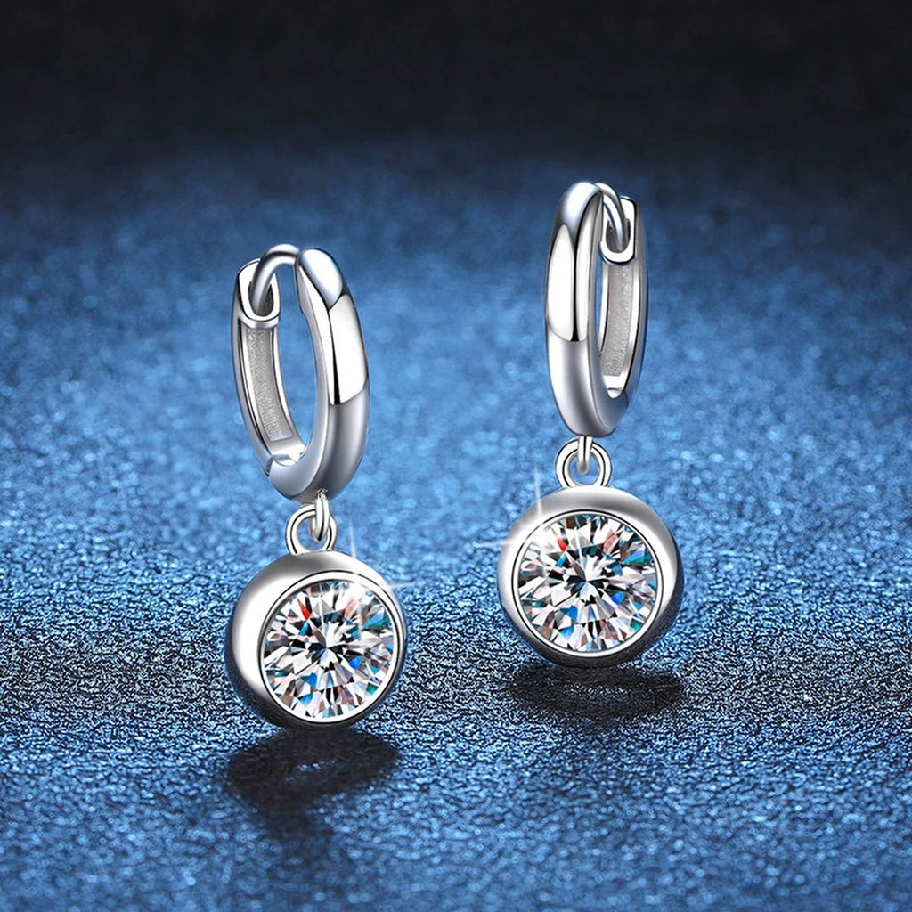 Round Moissanite Hoop Earrings in White Gold-Plated S925 Sterling Silver blue scene close-up view