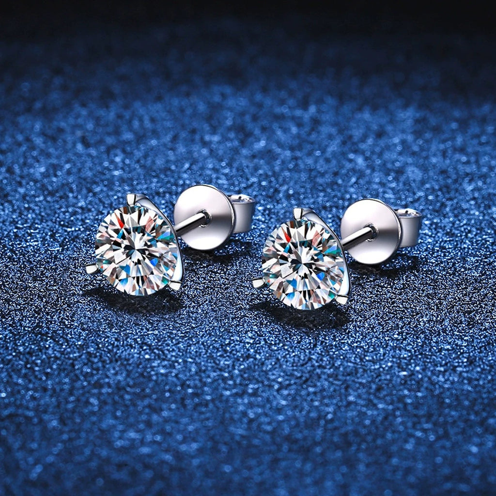 Round Moissanite Stud Earrings in White Gold-Plated S925 Sterling Silver blue scene angled view