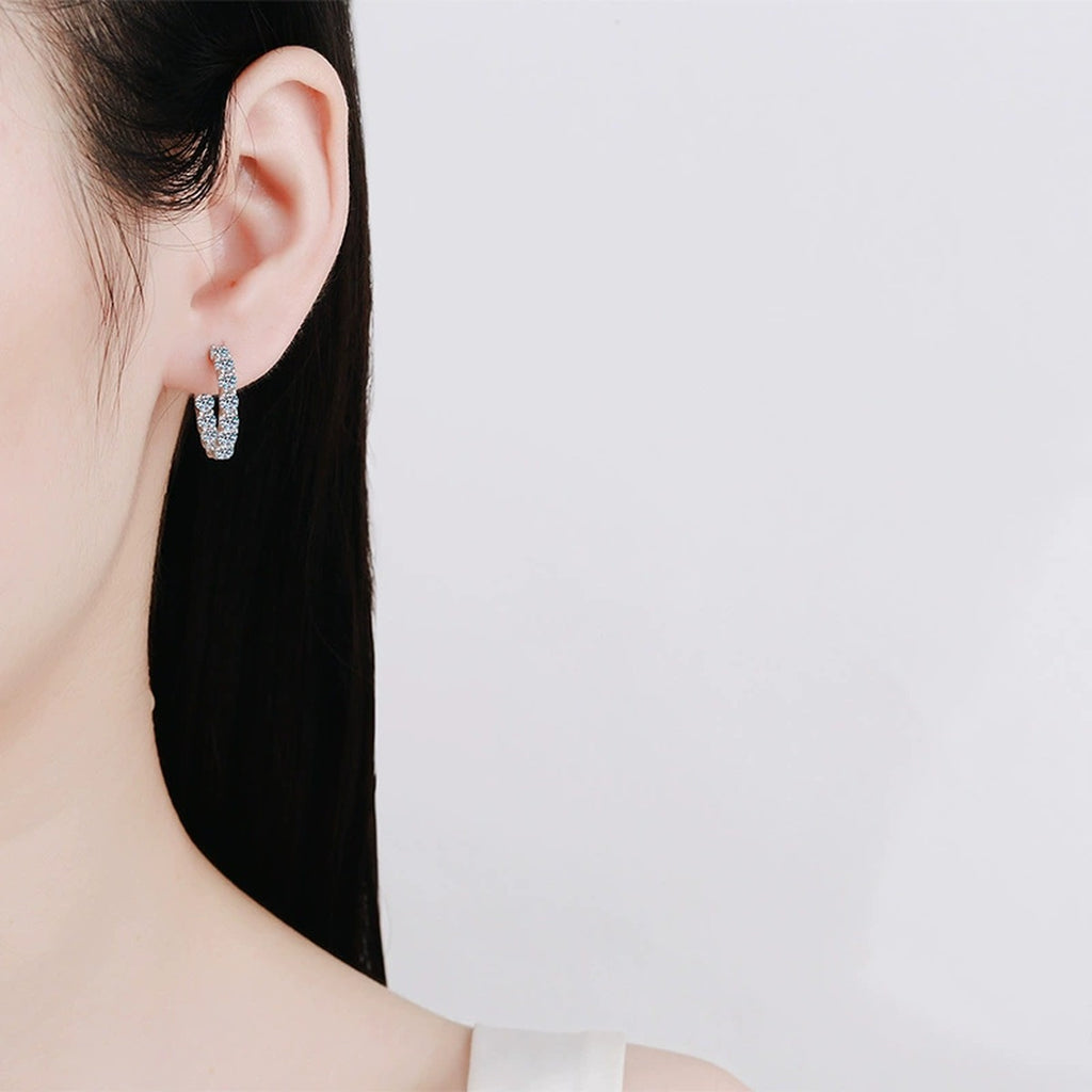 Inside-Out Moissanite Hoop Earrings in White Gold-Plated S925 Silver worn on ear by model