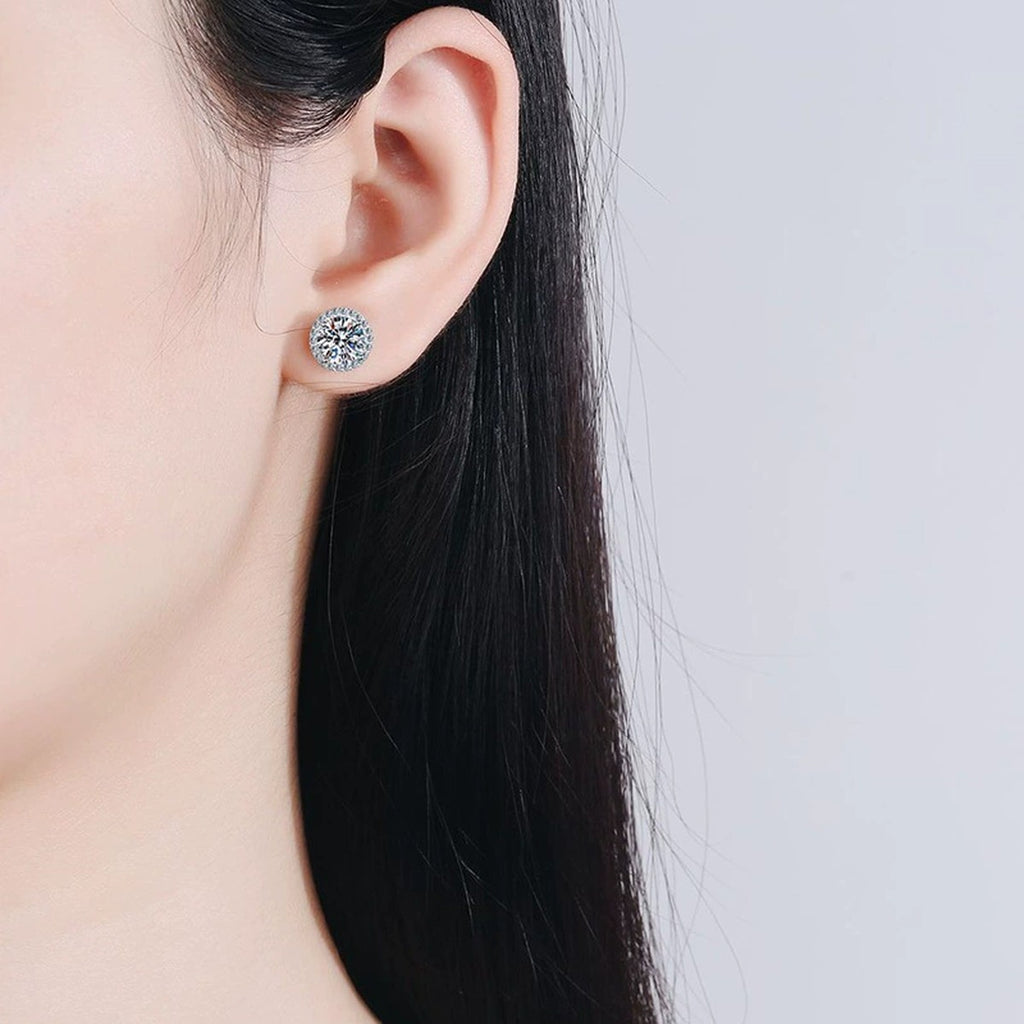 Round Halo Moissanite Stud Earrings with CZ in White Gold-Plated S925 worn on ear by model