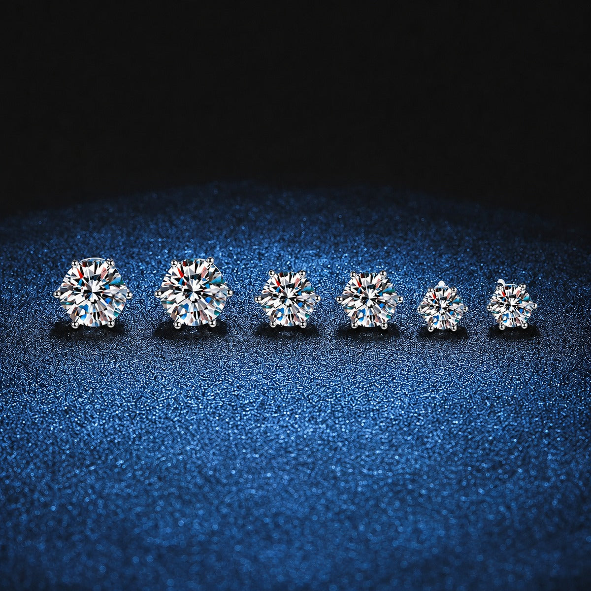 Round Moissanite Stud Earrings in White Gold-Plated S925 Sterling Silver blue scene product view