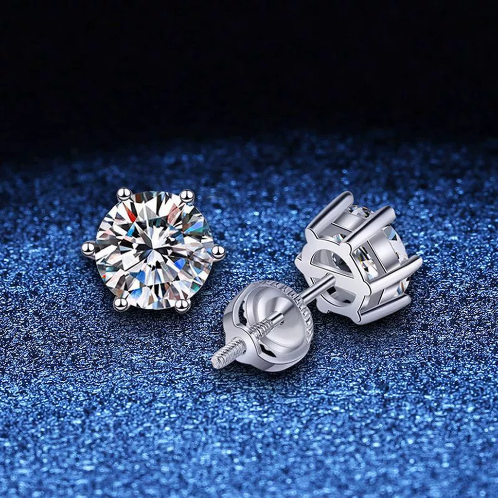 Round Moissanite Stud Earrings in White Gold-Plated S925 Sterling Silver blue scene close-up view