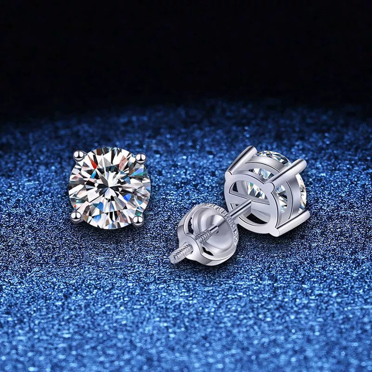 Round Moissanite Stud Earrings in White Gold-Plated S925 Sterling Silver blue scene angled view