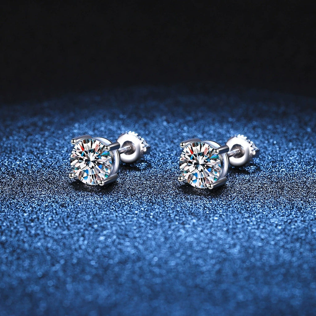 Round Moissanite Stud Earrings in White Gold-Plated S925 Sterling Silver blue scene close-up view