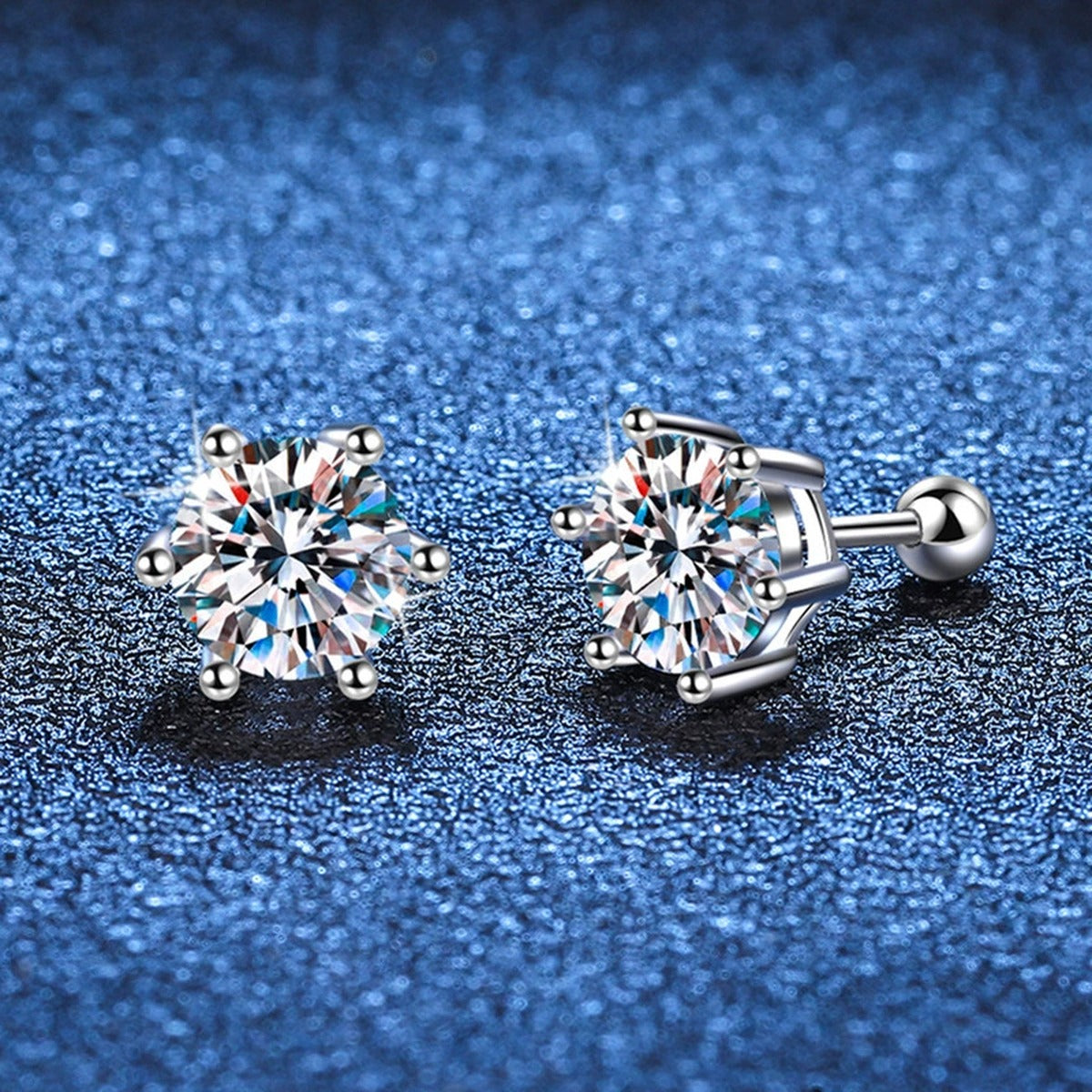 Round Moissanite Stud Earrings in White Gold-Plated S925 Sterling Silver blue scene angled view