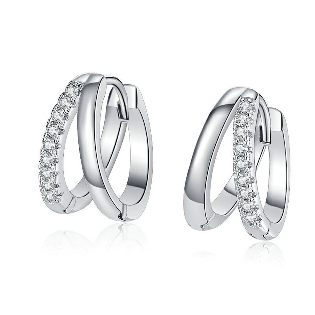 Pavé Moissanite Hoop Earrings in White Gold-Plated S925 Sterling Silver on clean white background showing the pair and rounded hoops with slim pavé moissanite rows