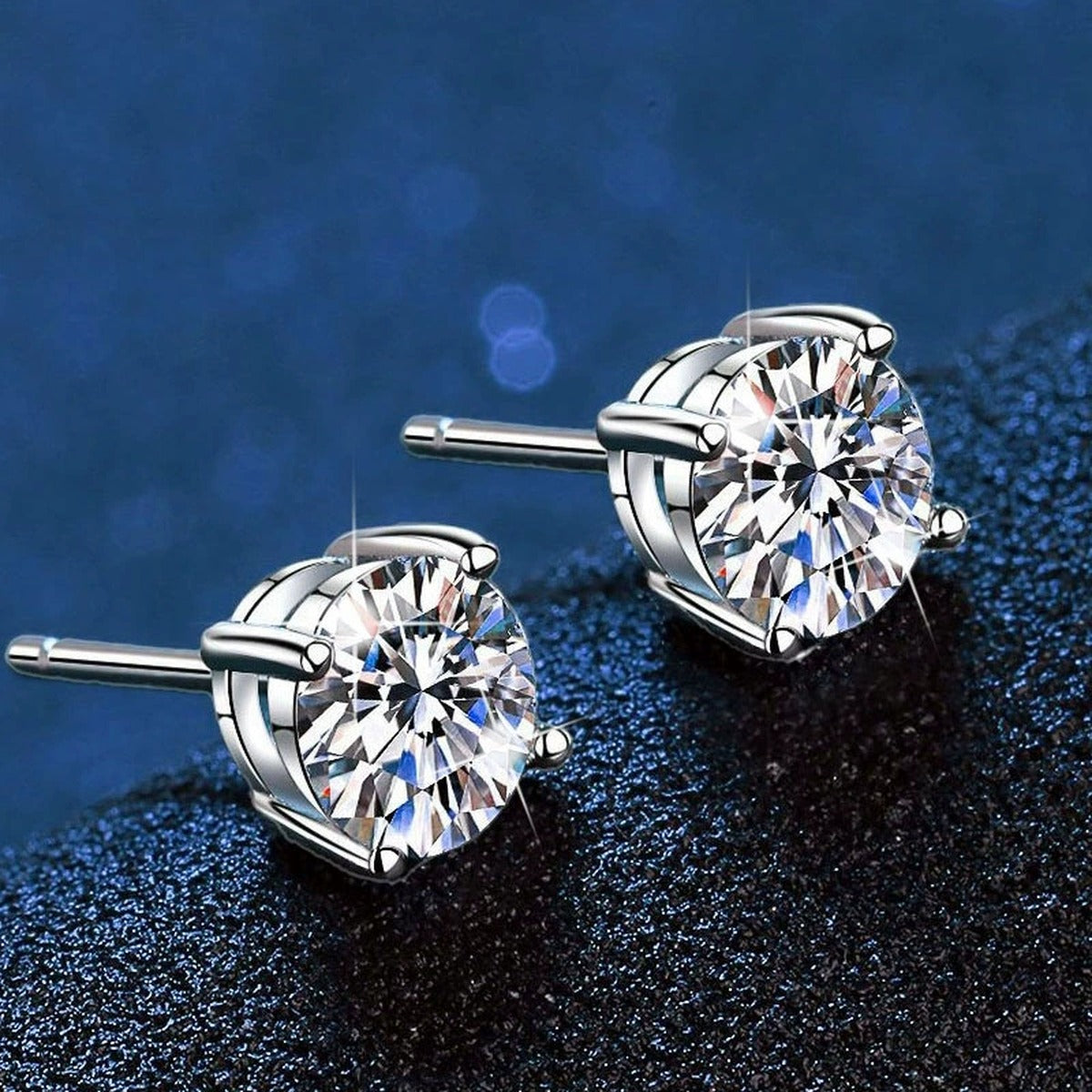 Round Moissanite Stud Earrings in White Gold-Plated S925 Sterling Silver blue scene product view