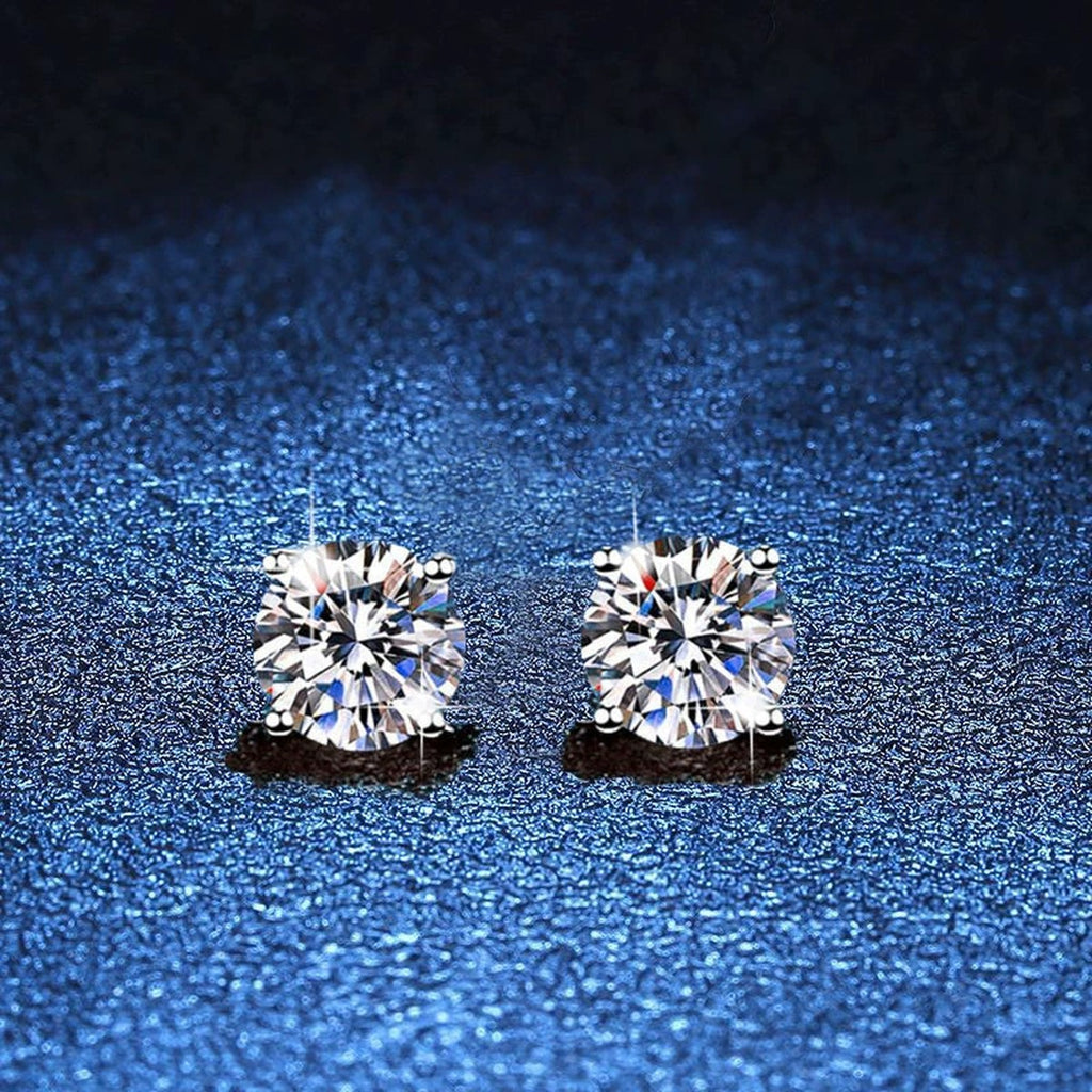 Round Moissanite Stud Earrings in White Gold-Plated S925 Sterling Silver blue scene angled view