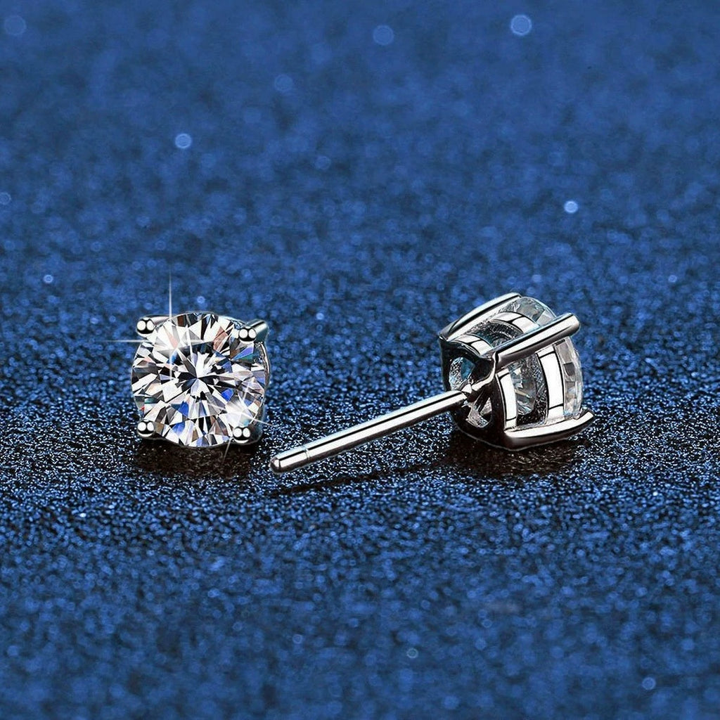 Round Moissanite Stud Earrings in White Gold-Plated S925 Sterling Silver blue scene close-up view