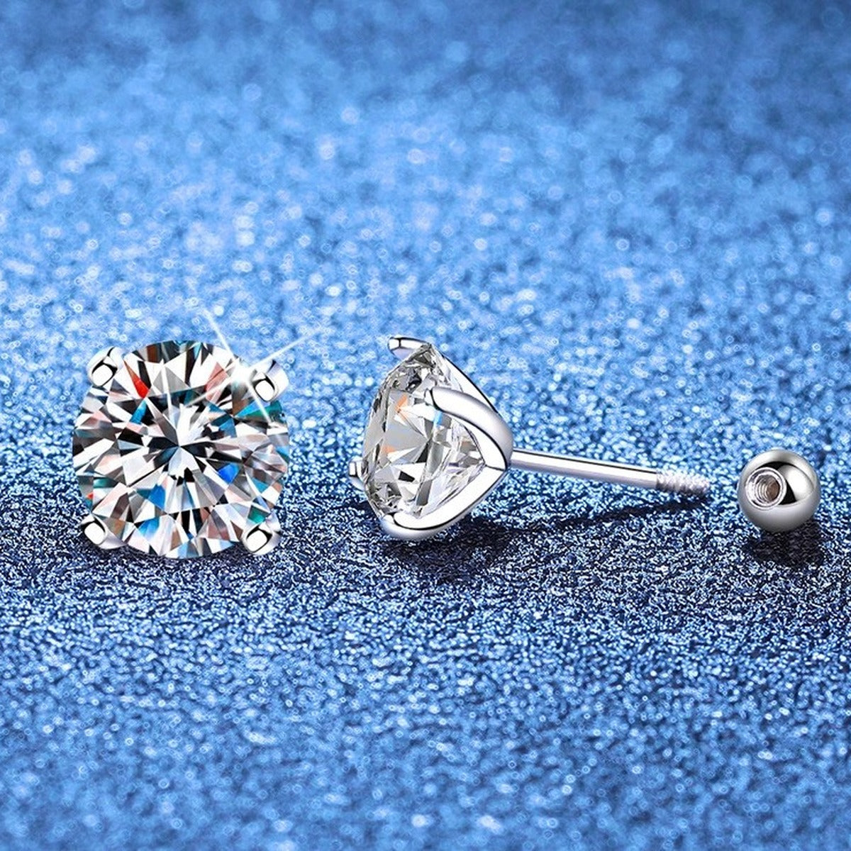 Round Moissanite Stud Earrings in White Gold-Plated S925 Sterling Silver blue scene close-up view