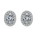 Oval Halo Moissanite Stud Earrings with CZ in White Gold-Plated S925 on clean white background showing the pair and oval halo studs with soft elongated moissanite centers