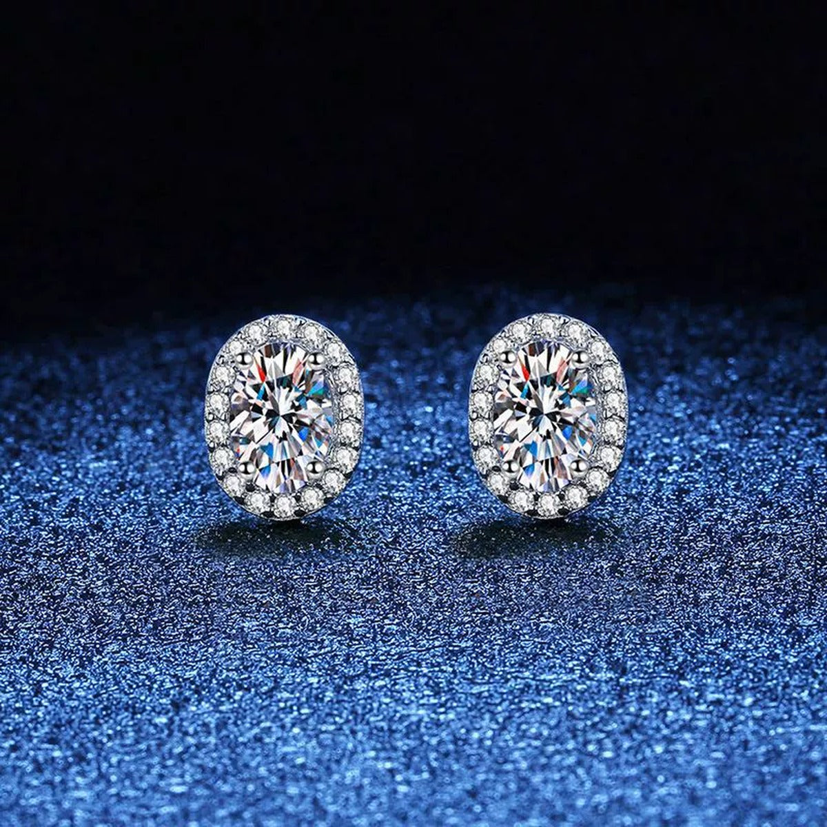 Oval Halo Moissanite Stud Earrings with CZ in White Gold-Plated S925 blue scene angled view