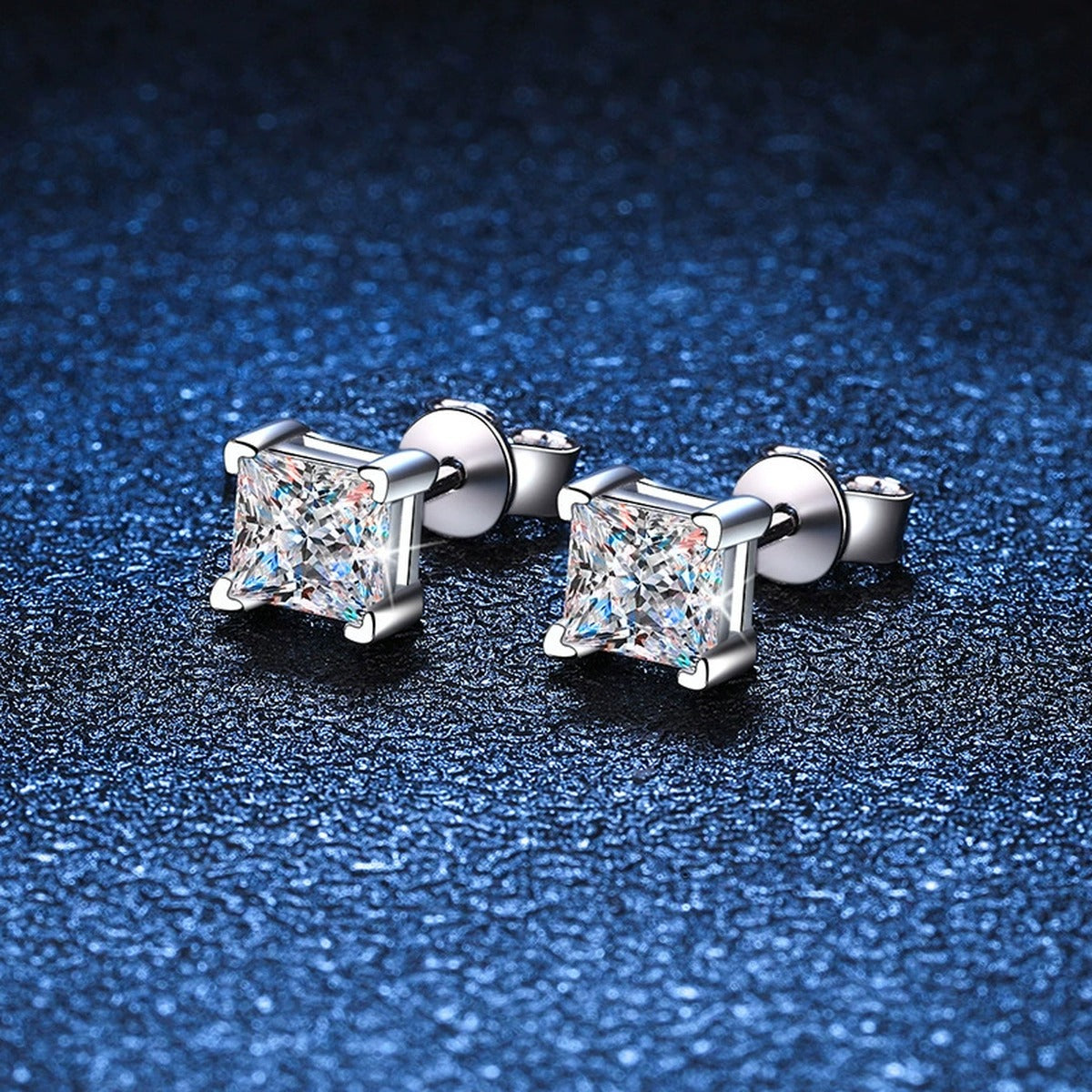 Princess Cut Moissanite Stud Earrings in White Gold-Plated S925 Silver blue scene angled view