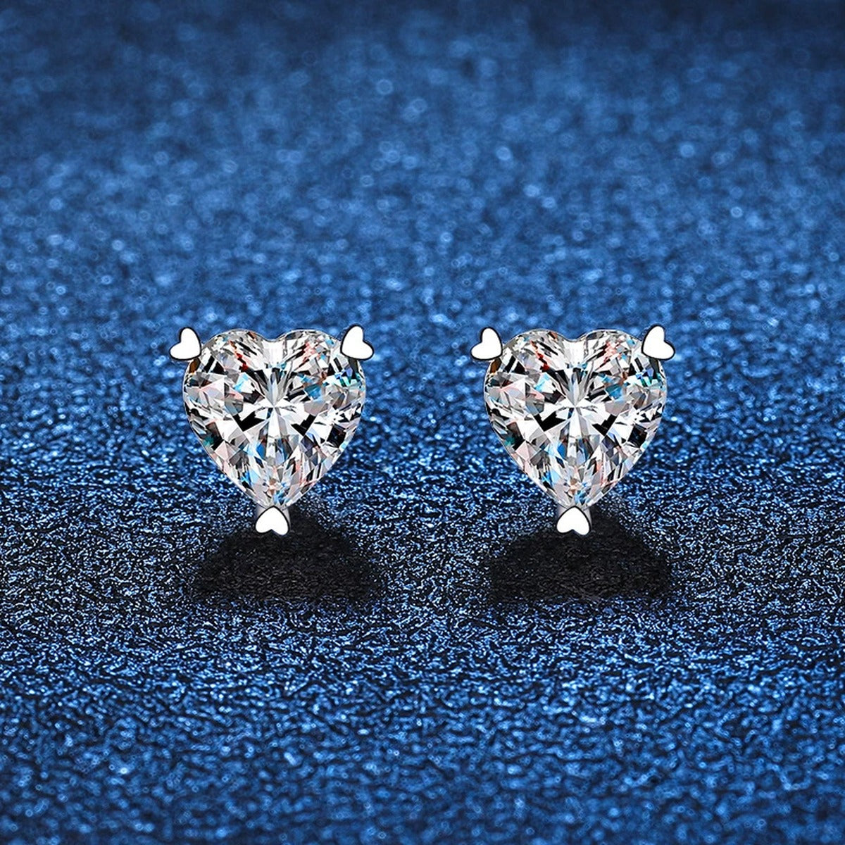 Heart Moissanite Stud Earrings in White Gold-Plated S925 Silver blue scene close-up view