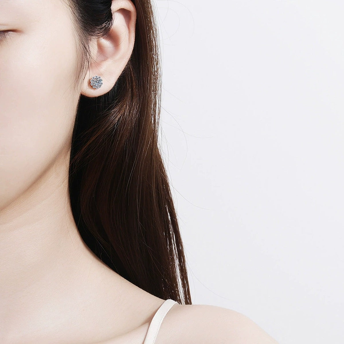 Snowflake Cluster Moissanite Stud Earrings with CZ in White Gold-Plated S925 worn on ear by model