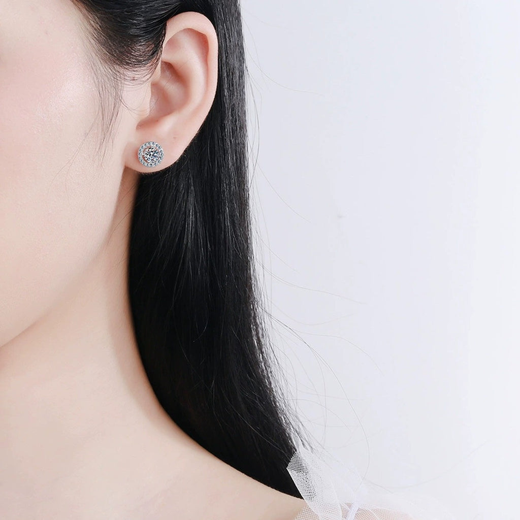 Round Halo Moissanite Stud Earrings with CZ in White Gold-Plated S925 worn on ear by model