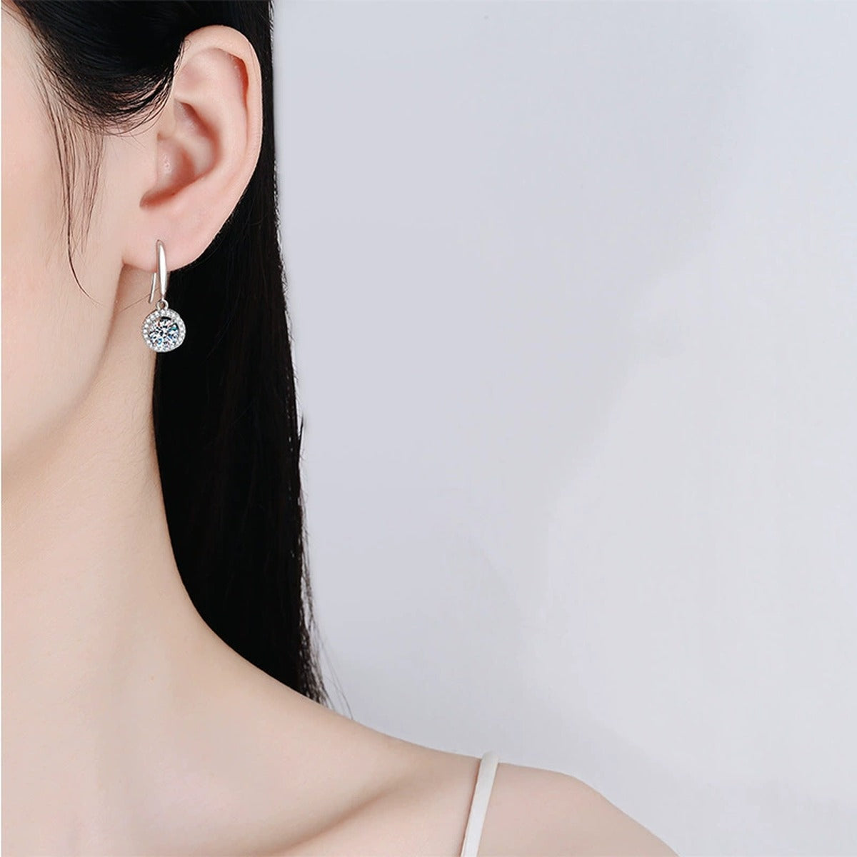 Floral Moissanite Drop Earrings with CZ in White Gold-Plated S925 worn on ear by model