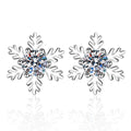 Snowflake Moissanite Stud Earrings in White Gold-Plated S925 Silver on clean white background showing snowflake-inspired stud earrings with a layered round outline