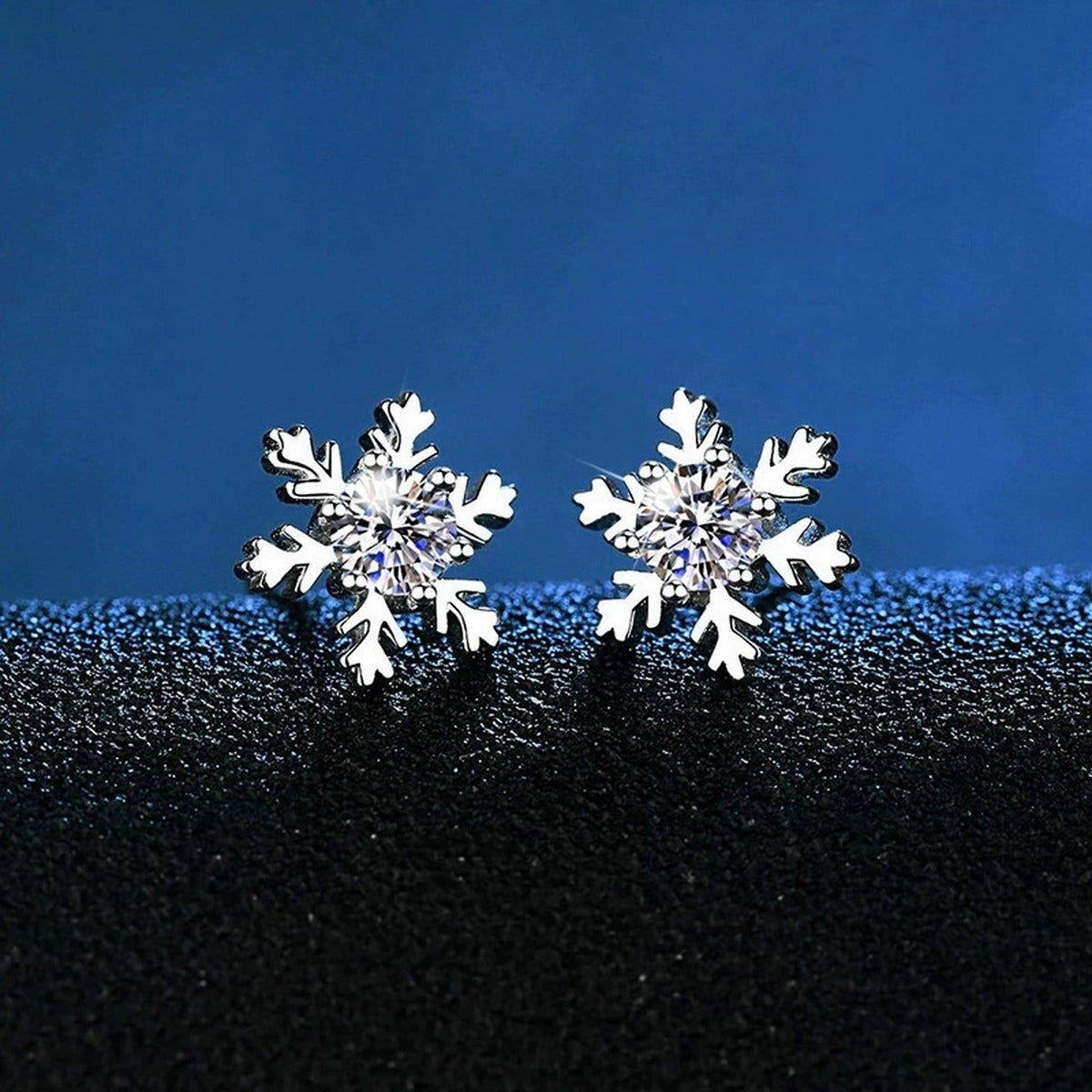 Snowflake Moissanite Stud Earrings in White Gold-Plated S925 Silver blue scene angled view