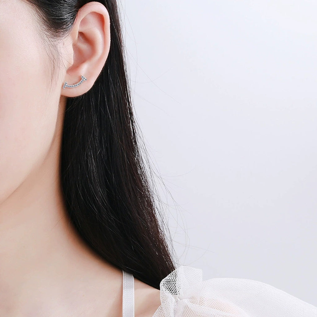 Curved Moissanite Ear Climber Stud Earrings in White Gold-Plated S925 worn on ear by model
