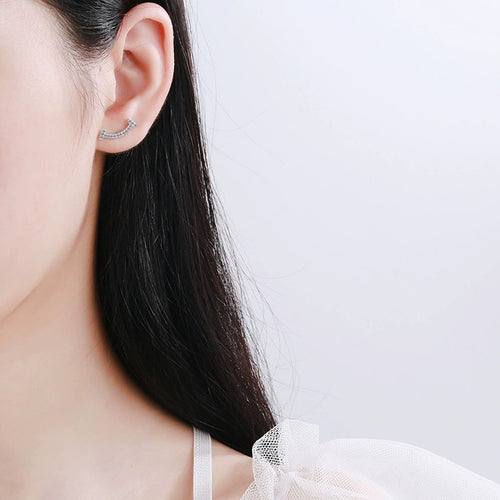 Curved Moissanite Ear Climber Stud Earrings in White Gold-Plated S925 worn on ear by model