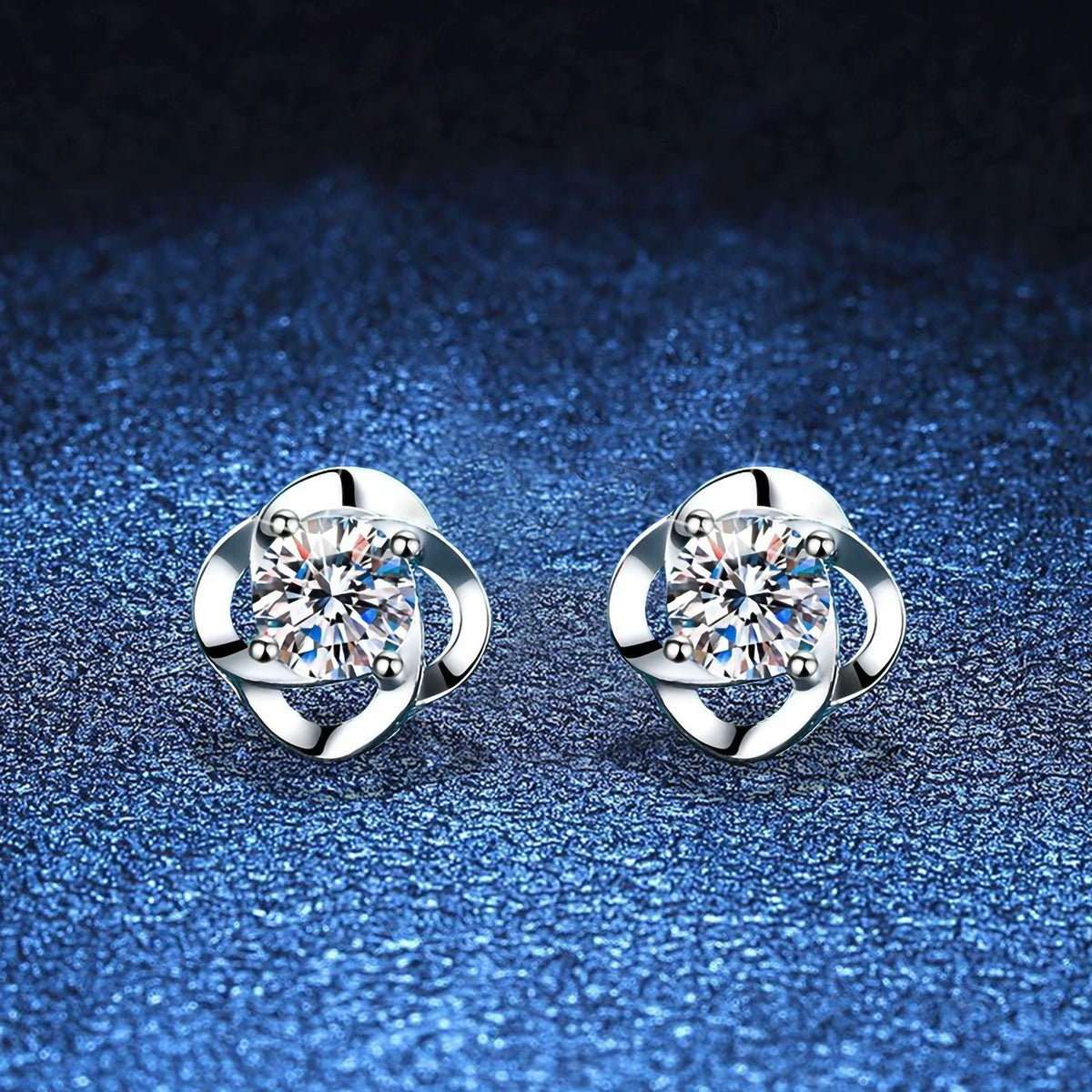 Round Bezel Moissanite Stud Earrings in White Gold-Plated S925 Silver blue scene close-up view