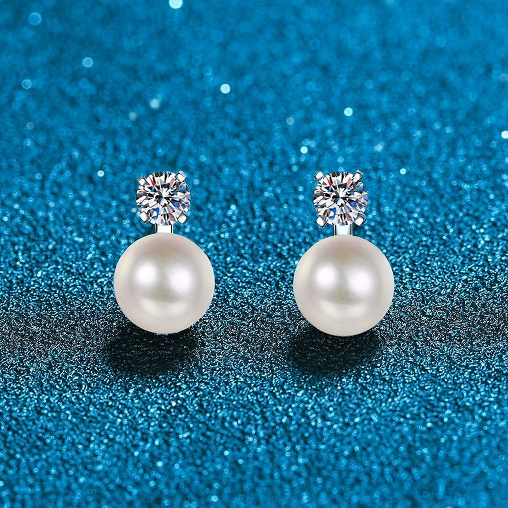 Pearl Moissanite Stud Earrings in White Gold-Plated S925 Sterling Silver blue scene angled view