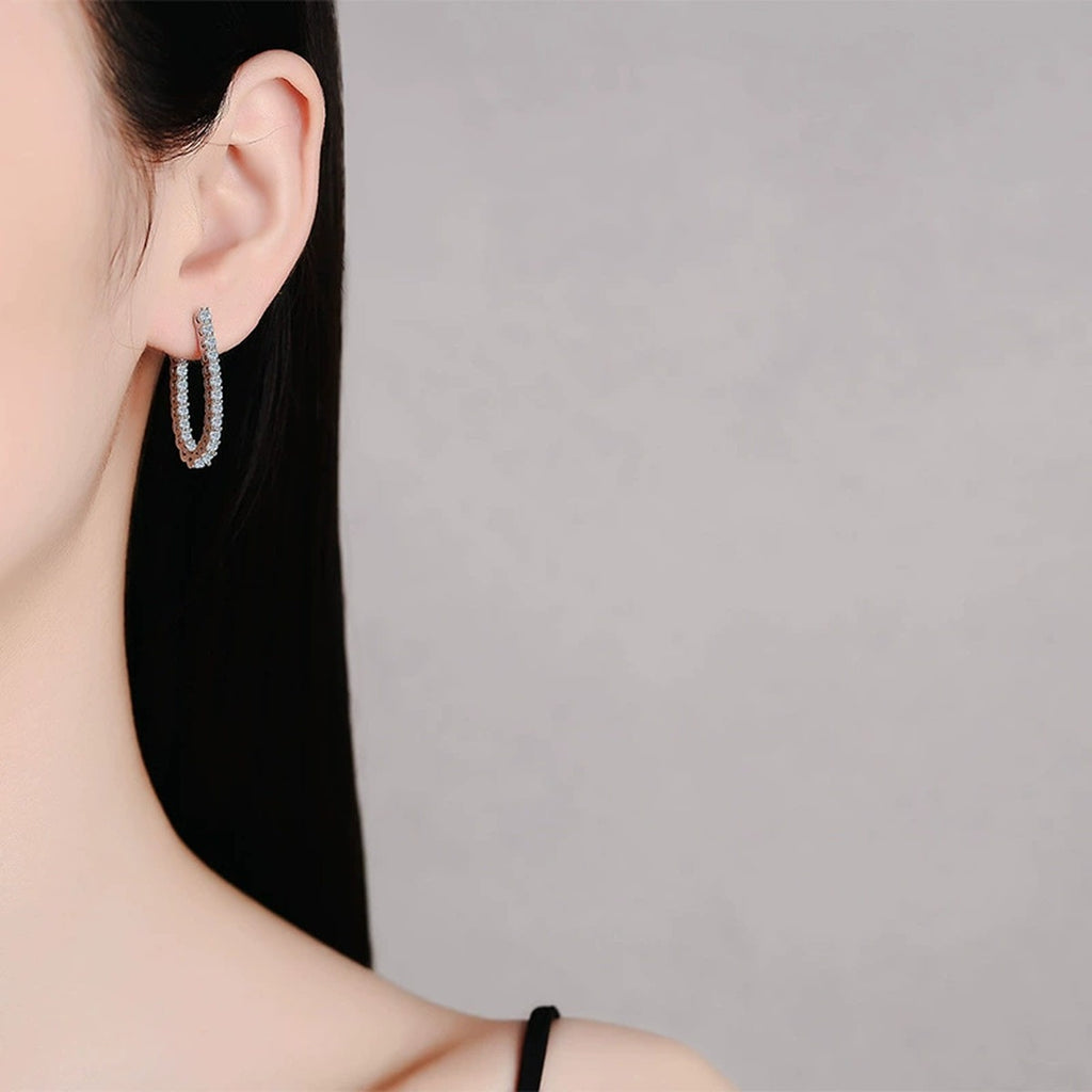 Pave Moissanite Hoop Earrings in White Gold-Plated S925 Sterling Silver worn on ear by model