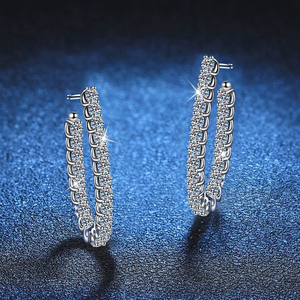 Pave Moissanite Hoop Earrings in White Gold-Plated S925 Sterling Silver blue scene angled view