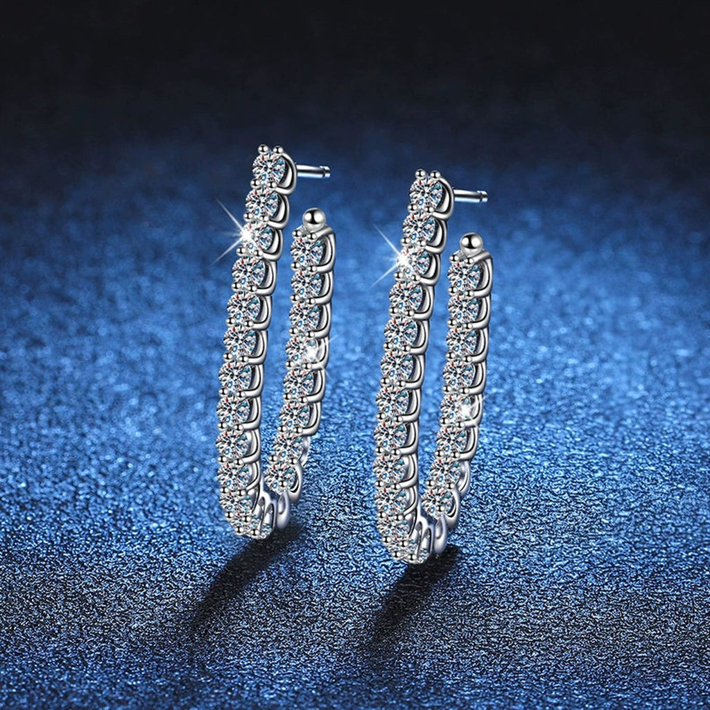 Pave Moissanite Hoop Earrings in White Gold-Plated S925 Sterling Silver blue scene close-up view