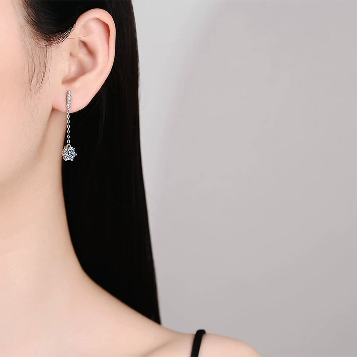 Linear Moissanite Drop Earrings with CZ in White Gold-Plated S925 worn on ear by model