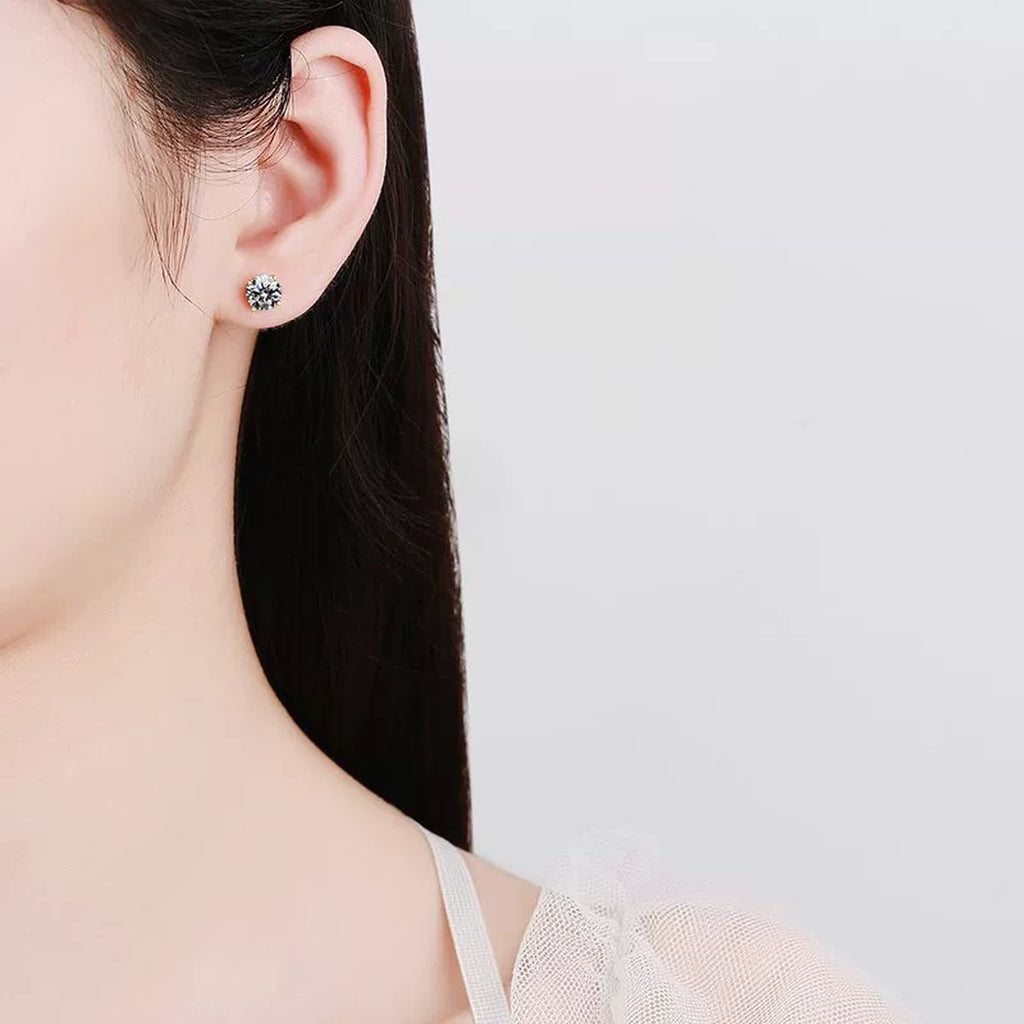 Round Moissanite Stud Earrings in Yellow Gold-Plated S925 Sterling Silver worn on ear by model