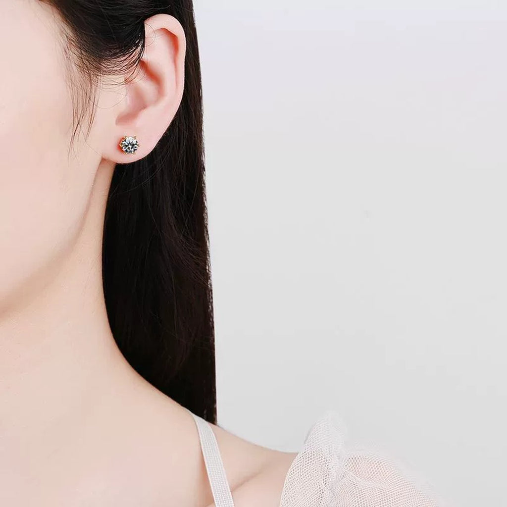 Round Moissanite Stud Earrings in Yellow Gold-Plated S925 Sterling Silver worn on ear by model