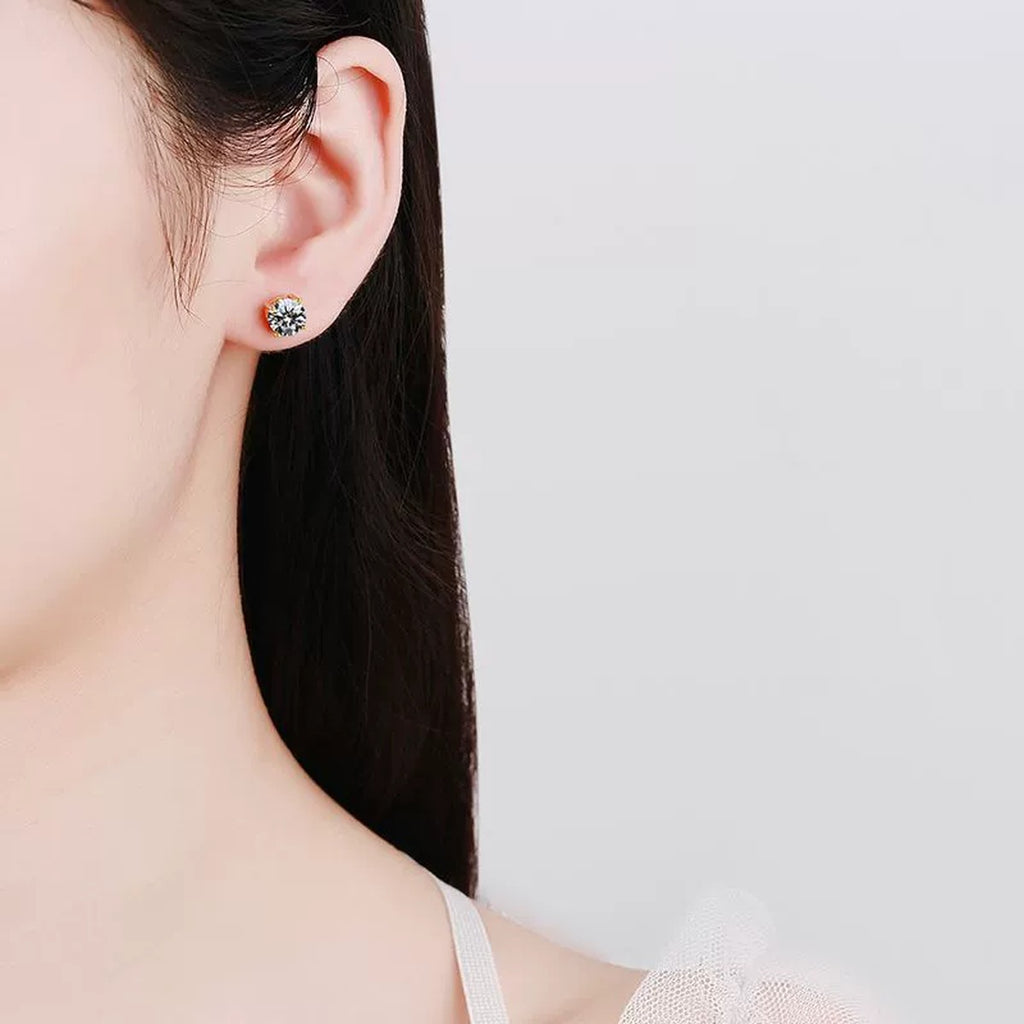 Round Moissanite Stud Earrings in Yellow Gold-Plated S925 Sterling Silver worn on ear by model