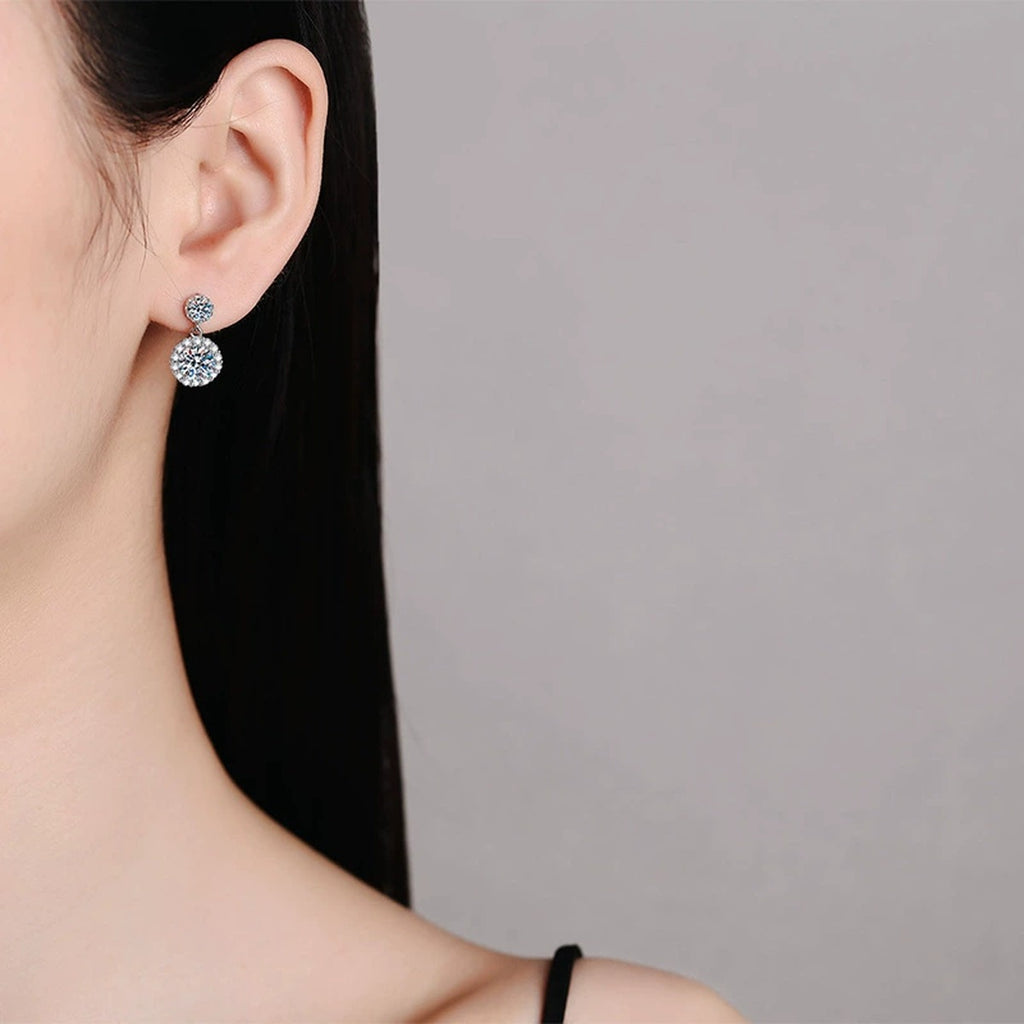 Round Halo Moissanite Drop Earrings with CZ in White Gold-Plated S925 worn on ear by model