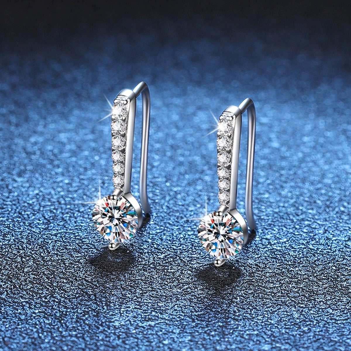 Round Moissanite Drop Earrings with CZ in White Gold-Plated S925 Silver blue scene angled view