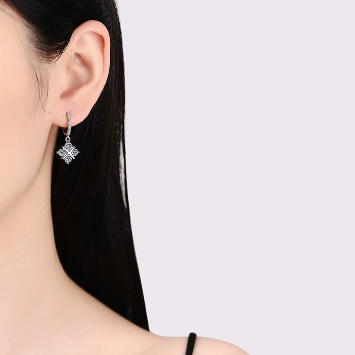 Diamond Shape Moissanite Drop Earrings with CZ in White Gold-Plated S925 worn on ear by model