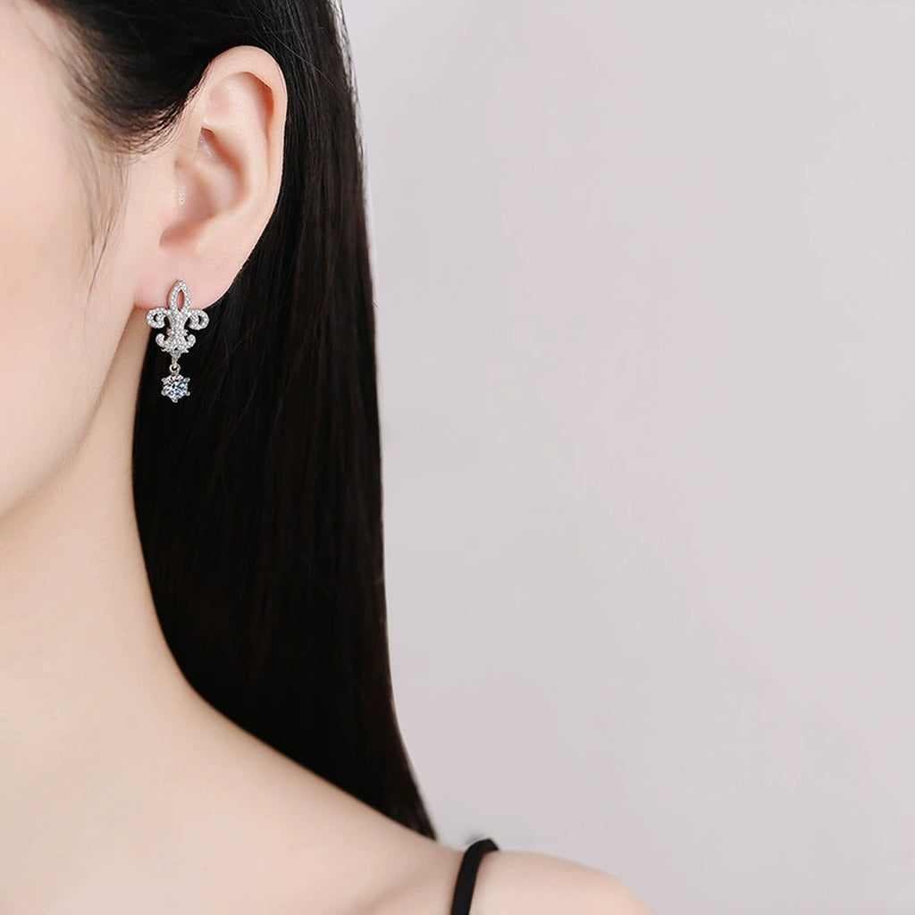 Fleur-De-Lis Moissanite Drop Earrings with CZ in White Gold-Plated S925 worn on ear by model