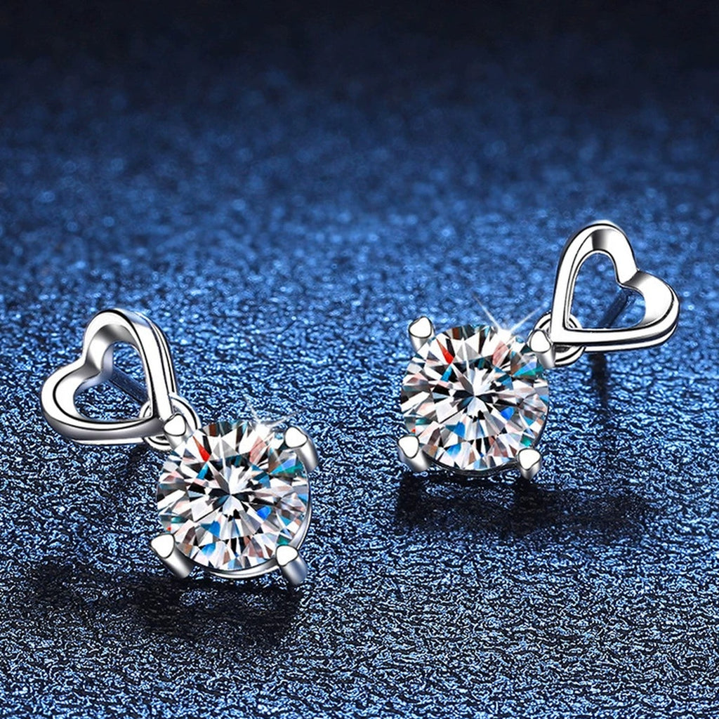 Heart Moissanite Drop Earrings in White Gold-Plated S925 Sterling Silver blue scene angled view