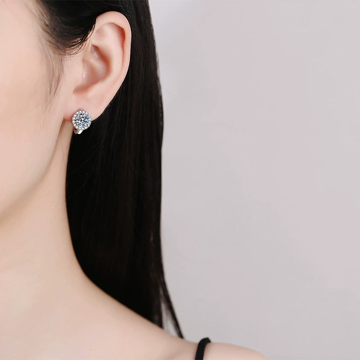 Round Halo Moissanite Stud Earrings with CZ in Gold-Plated S925 Silver worn on ear by model