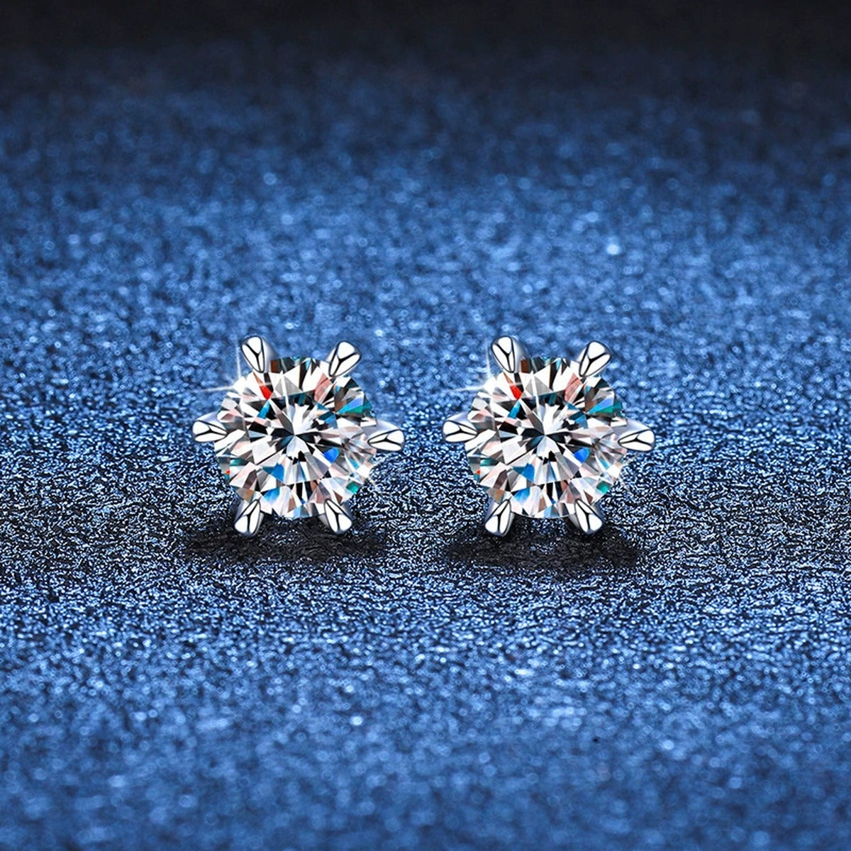 Floral Moissanite Stud Earrings in White Gold-Plated S925 Sterling Silver blue scene close-up view