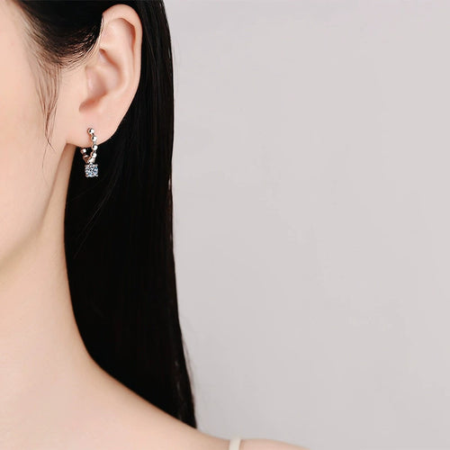 Beaded Hoop Moissanite Drop Earrings in White Gold-Plated S925 Silver worn on ear by model