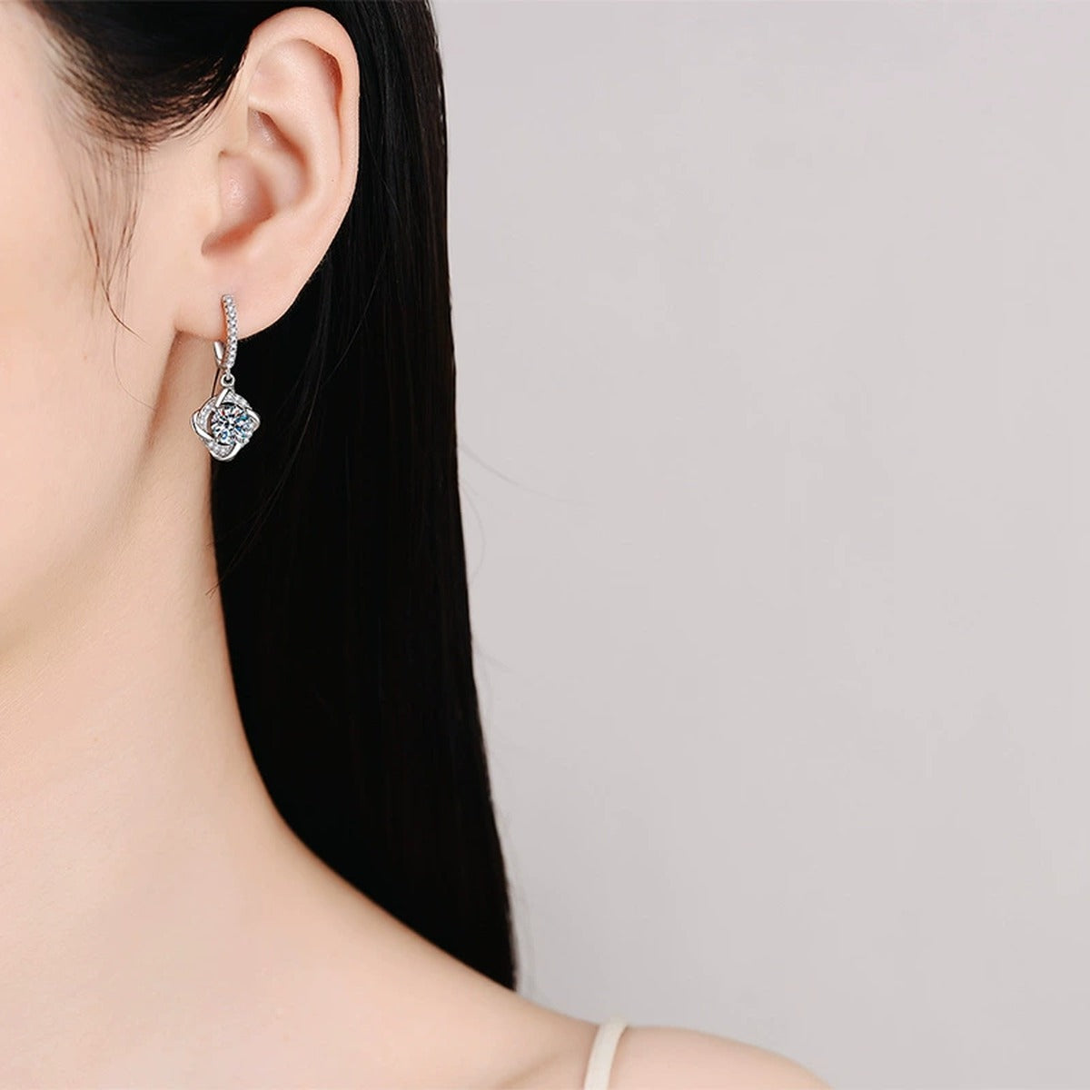 Cushion Moissanite Drop Earrings with CZ in White Gold-Plated S925 worn on ear by model