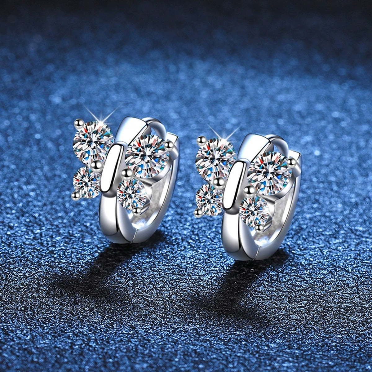 Cluster Moissanite Hoop Earrings in White Gold-Plated S925 Sterling Silver blue scene close-up view