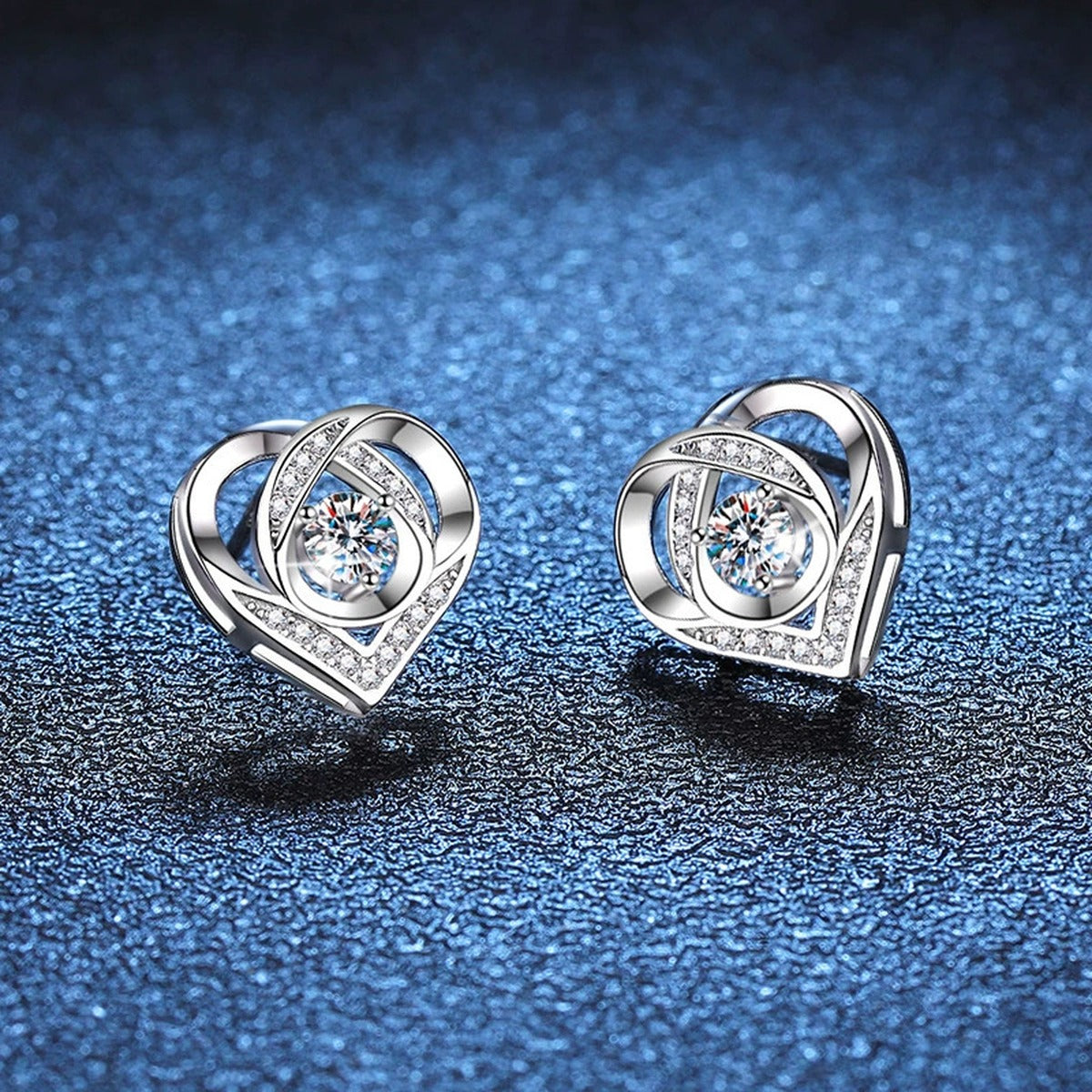 Heart Moissanite Stud Earrings with CZ in White Gold-Plated S925 Silver blue scene angled view