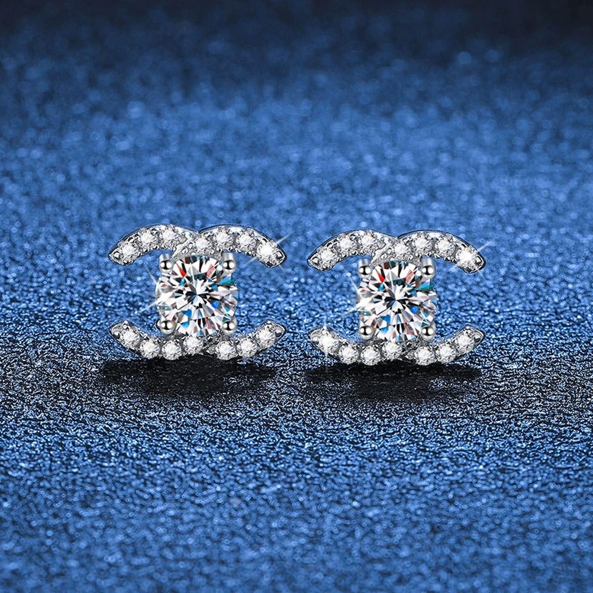 Crescent Moissanite Stud Earrings with CZ in Gold-Plated S925 Sterling Silver blue scene angled view