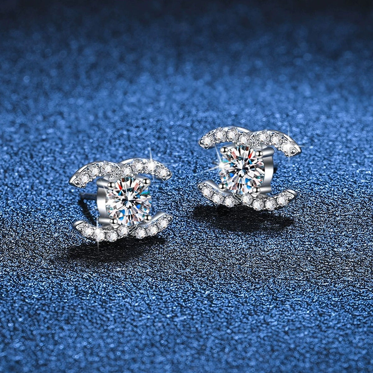 Crescent Moissanite Stud Earrings with CZ in Gold-Plated S925 Sterling Silver blue scene close-up view