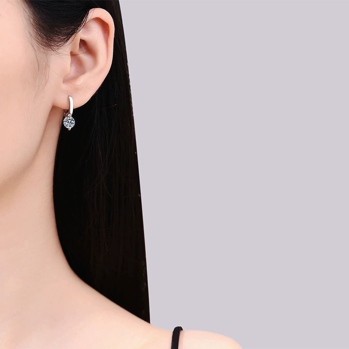 Round Moissanite Hoop Drop Earrings in White Gold-Plated S925 Silver worn on ear by model